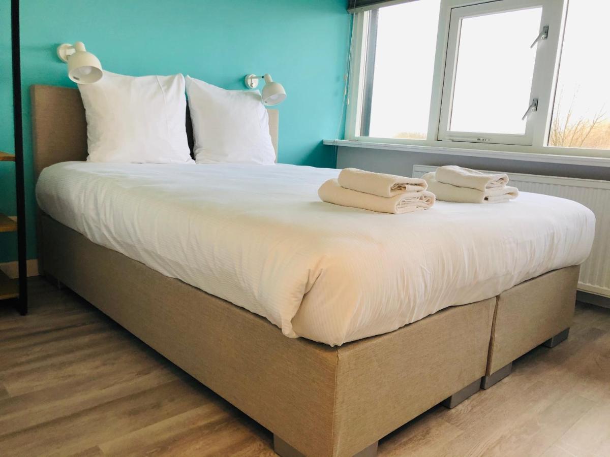 Strandlogement Om De Noord 斯希蒙尼克奥赫 外观 照片